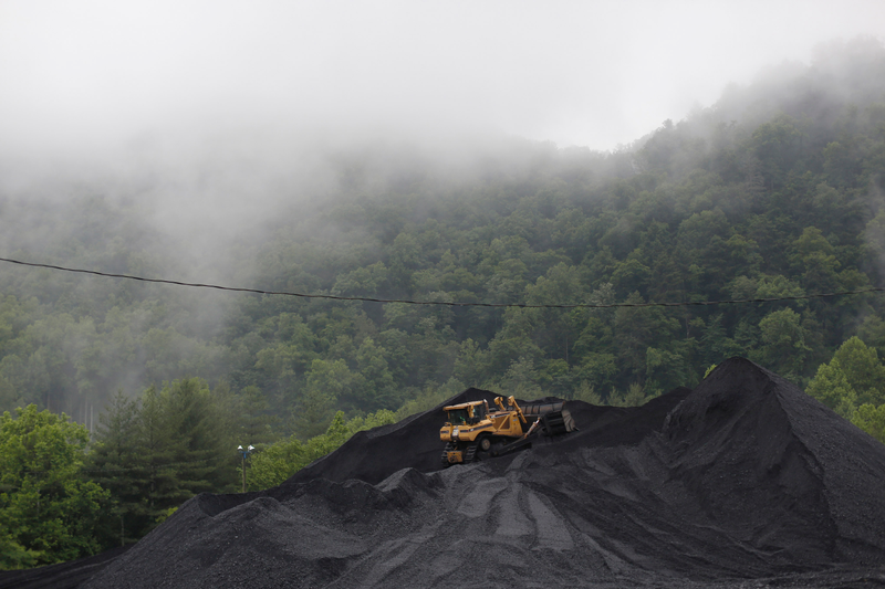 A bulldozer operates atop a coal mound at the CCI Energy Slones Branch Terminal June 3, 2014 in Shelbiana, Kentucky. Getty images